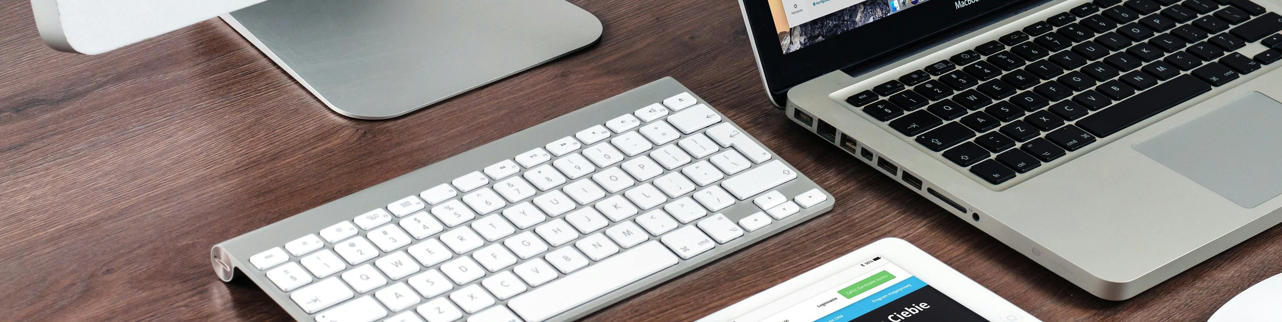 responsive website displayed on desktop, laptop, and tablet devices