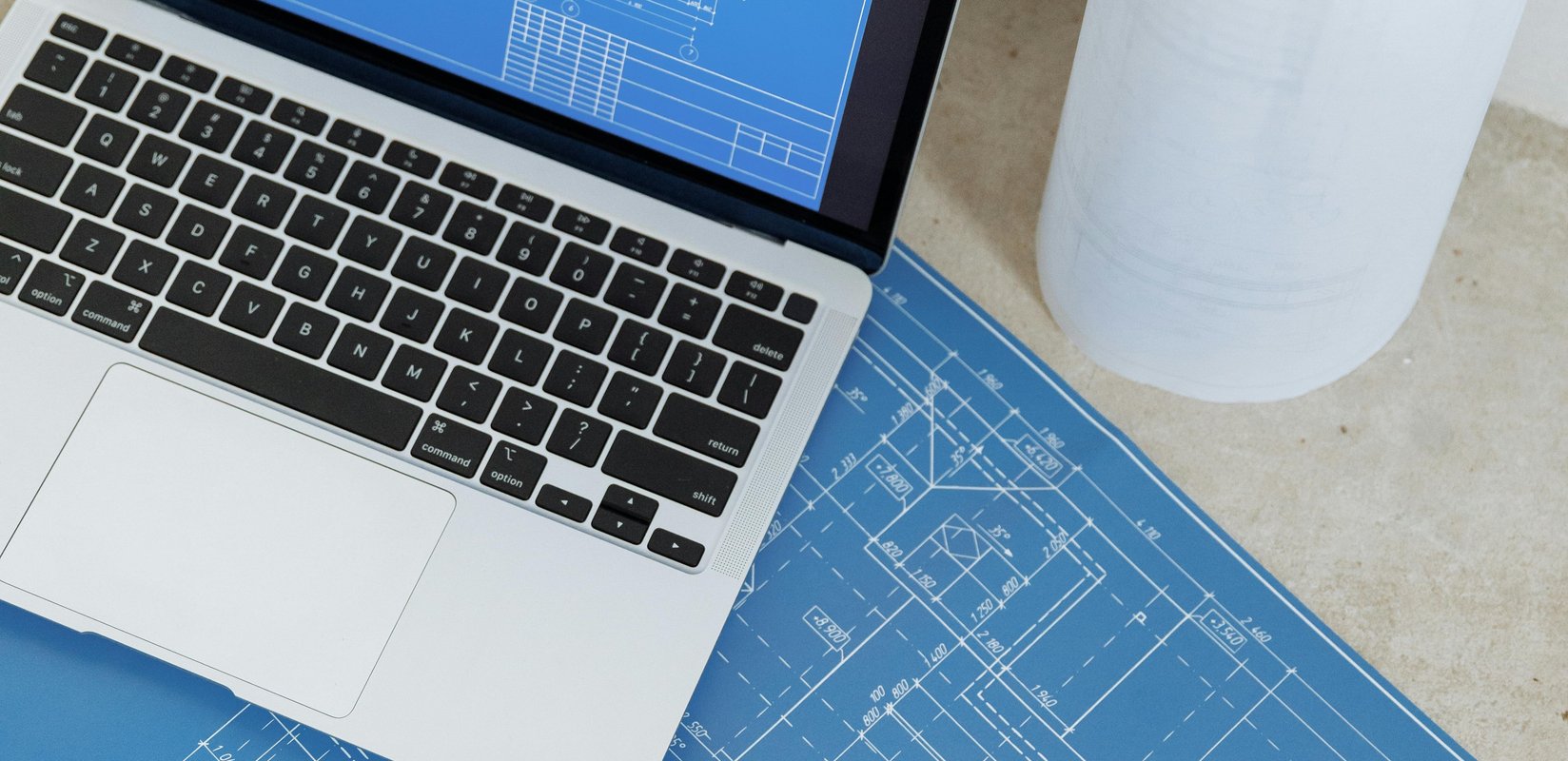 website planning notes and laptop for small business pricing